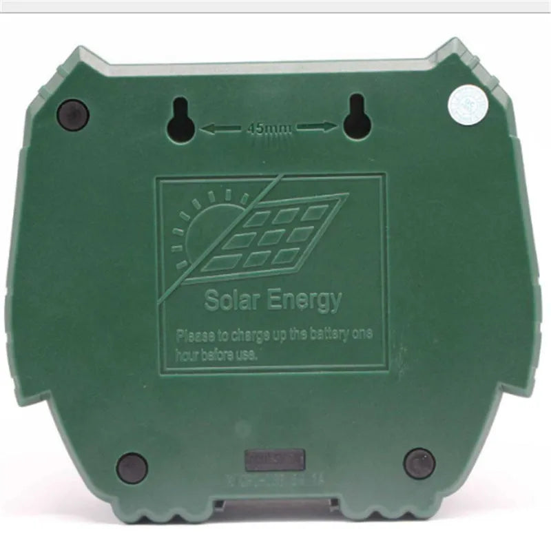 Green solar ultrasonic animal repeller unit showing dimensions and outdoor installation.