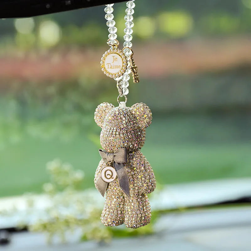 White, pastel, and black Violent Bear car mirror pendant with rhinestones, 5cm by 9cm.