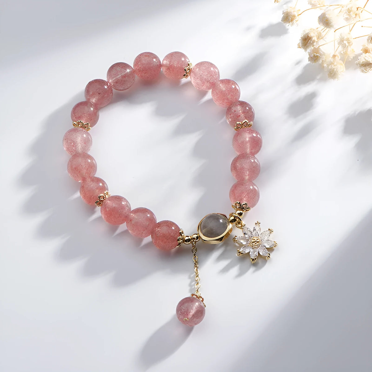 Mori style strawberry quartz crystal bracelet with electroplated finish and floral elements