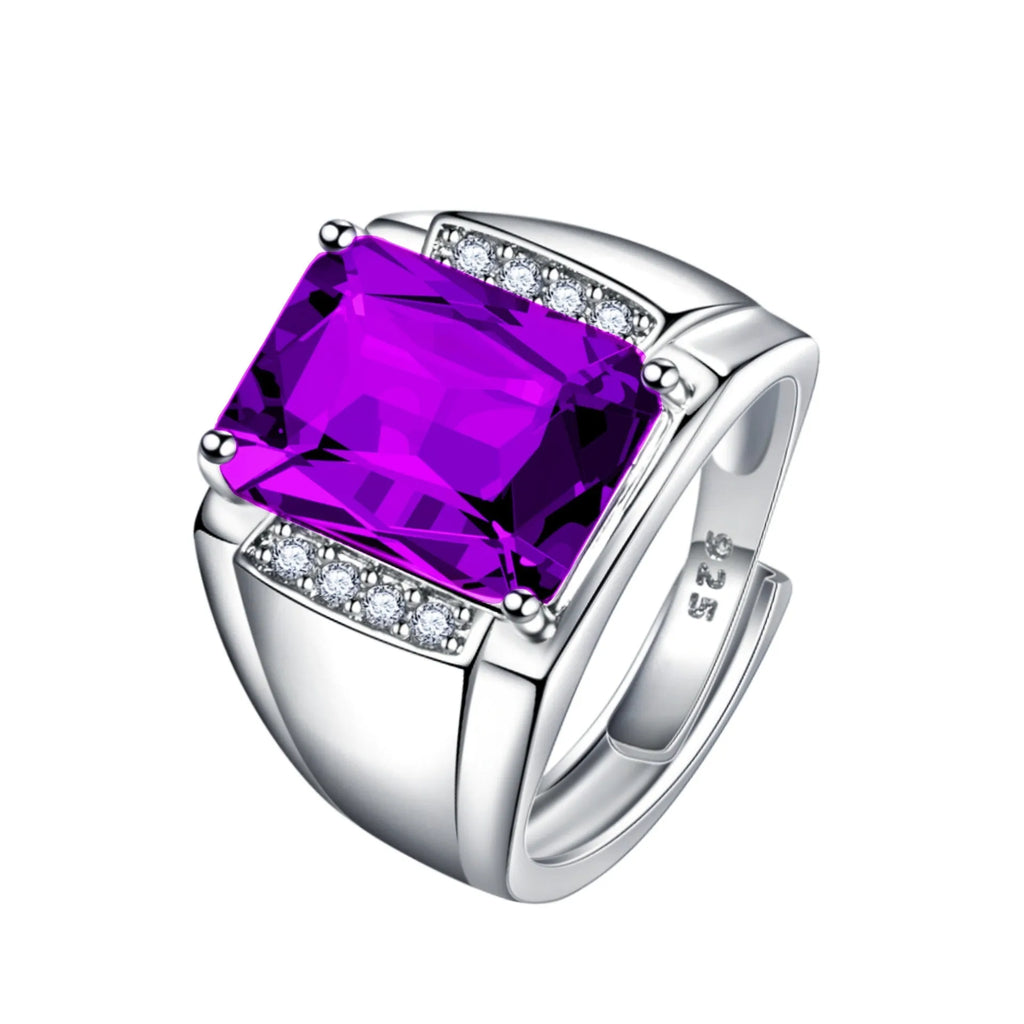 Adjustable geometric copper ring with a sparkling purple amethyst-coloured gemstone.