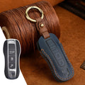 Genuine cowhide leather Porsche key cover in retro bag buckle style, blue and brown colour options.