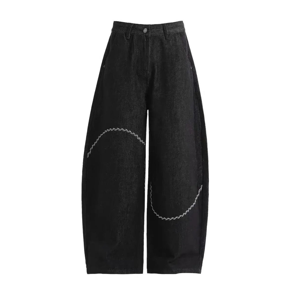 Men's black straight-leg jeans with a mid-waist design and zip fly, made from micro-elastic polyester denim.