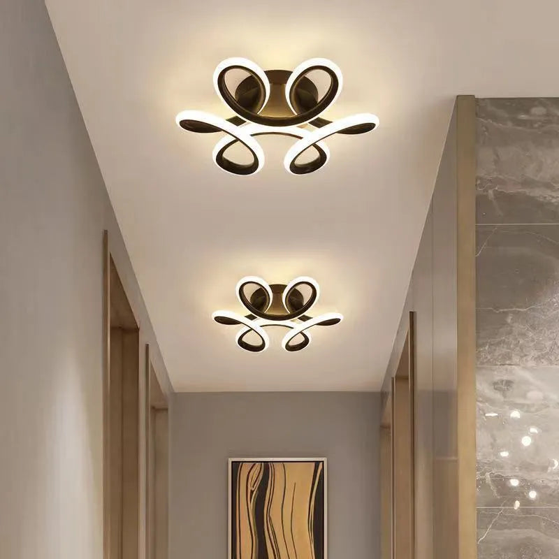 Modern LED corridor light with silicone shade for hallways and entranceways in black or white finish