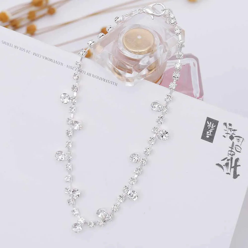 Silver tone water drop anklet with tassel and inlaid stone detail, 24+5 cm women's anklet
