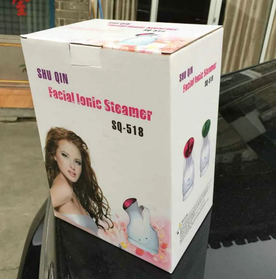 White handheld humidifying steaming machine, 280W, 220V-50HZ, 143x105x225mm, with 40°C mist output and plug options.