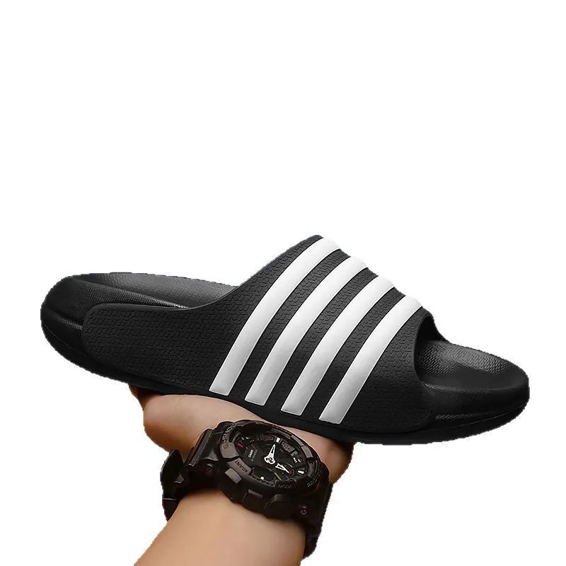 Casual unisex PVC and EVA slippers in beige, black and white, blue and white, and green colours.