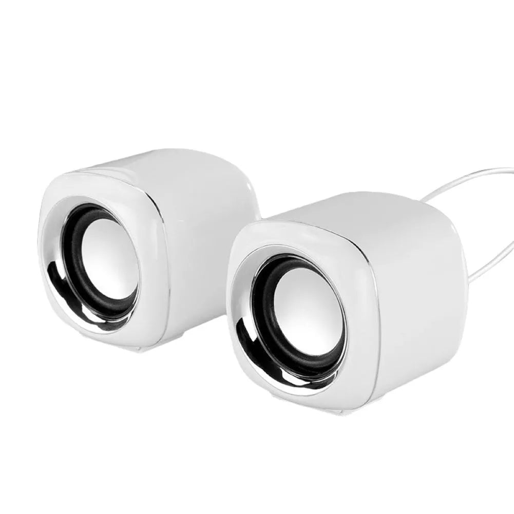 Pair of black cubic desktop speakers measuring 7.2cm with volume scroll wheel and 3.5mm cable