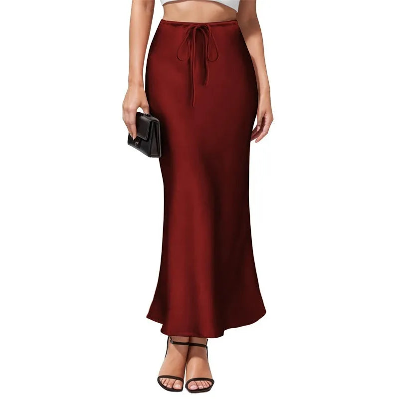Asymmetric high-waisted acetate satin skirt in a solid colour with irregular stitching detail