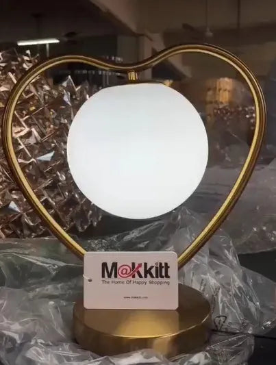 30cm tall heart-shaped transparent acrylic lamp with flickering LED flame effect