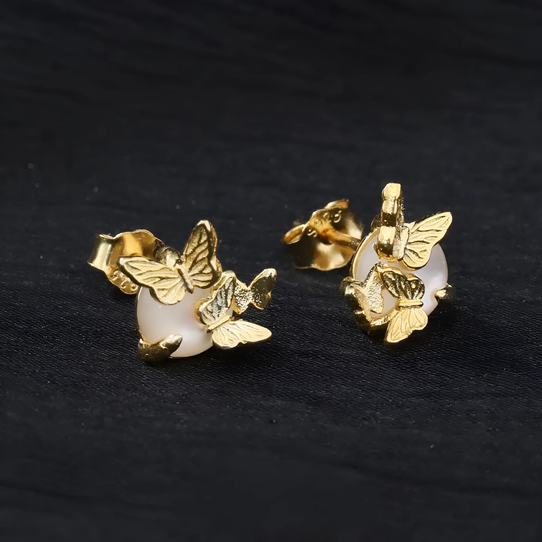 Butterfly ear studs in 925 sterling silver with electroplated white gold or gold finish and zodiac animal design
