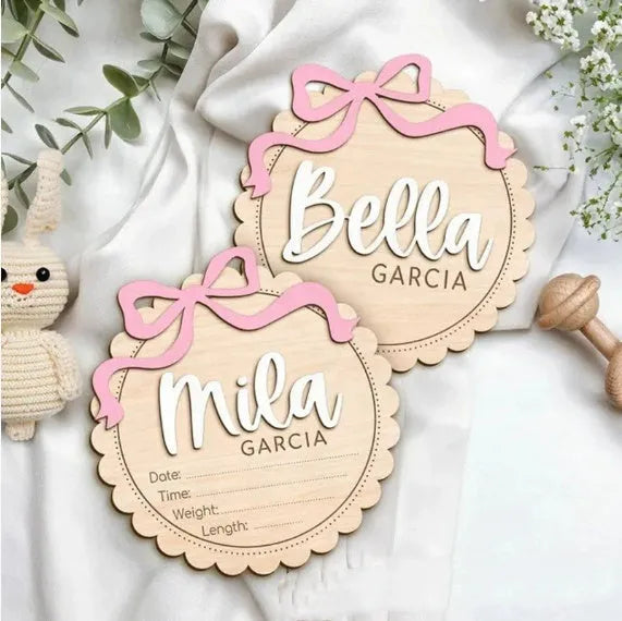 Square wooden baby room decoration ornament with a personalised name engraved in the centre.