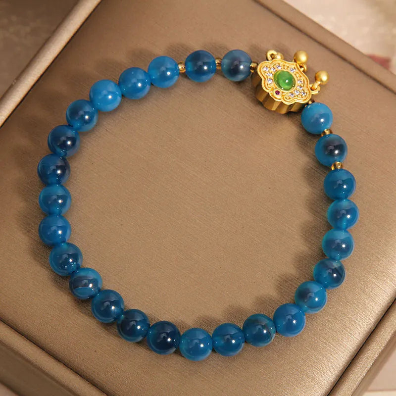 Blue sugar heart agate safety lock pendant bracelet for women with crystal construction and rhinestone detailing