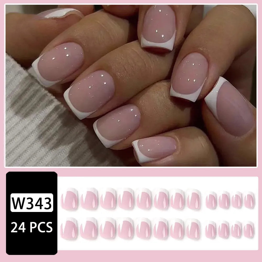 24 white plaid-patterned plastic fake nail tips arranged showing design detail
