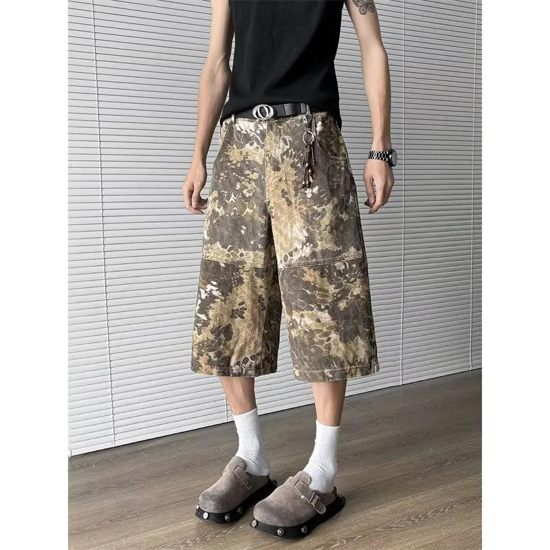 Yellow snake pattern camouflage cropped jeans on a model.