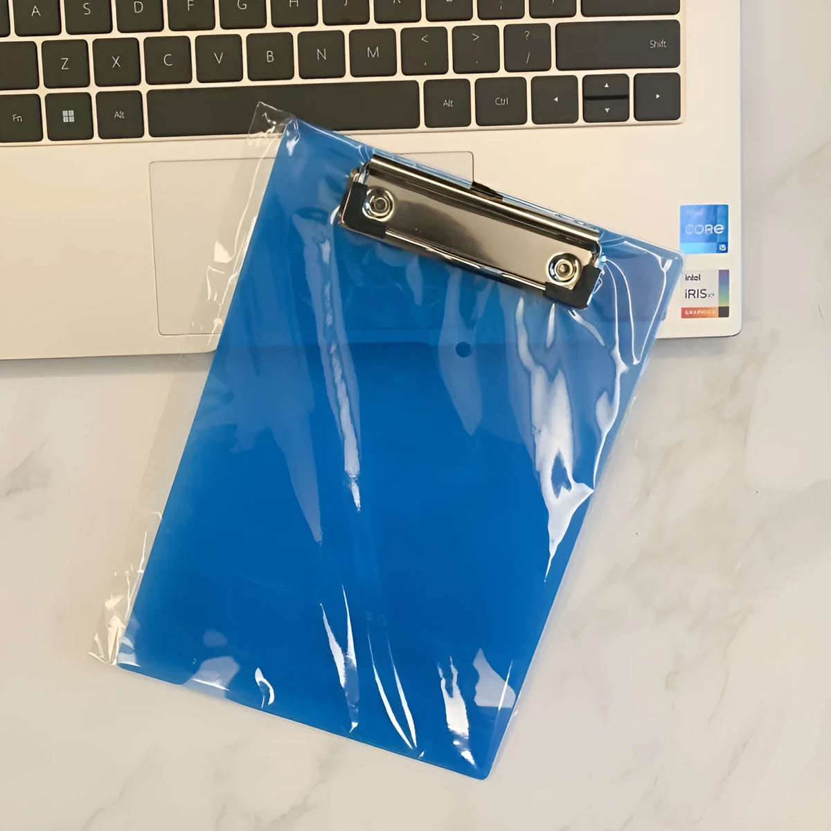 Transparent A4 plastic clipboard with metal clip in blue, green, red or white colour options