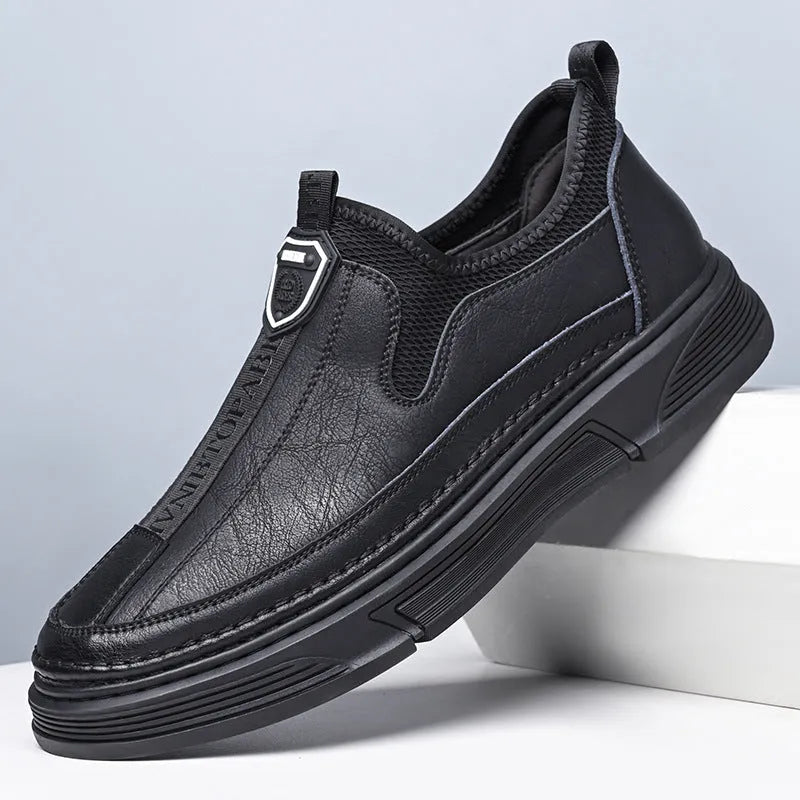 Men's casual leather shoes with round toe design in black or brown solid colours