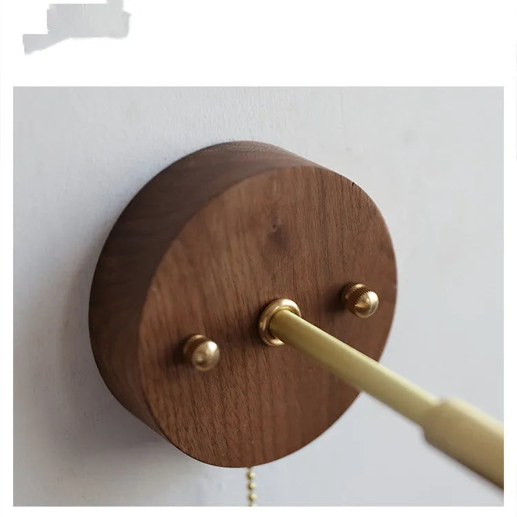 Nordic style wooden wall-mounted bedside lamp in walnut colour.