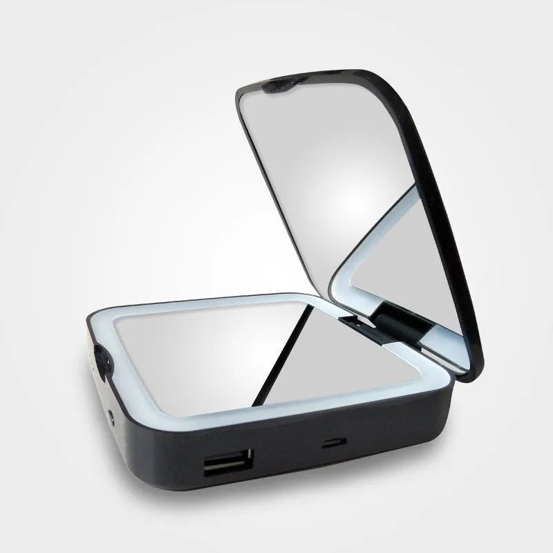 Makeup mirror with adjustable lighting showing black and white colour options with dual magnification surfaces