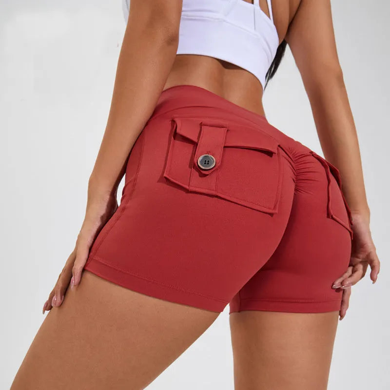 Women's high-waist hip lifting fitness shorts with pockets in electric blue colour