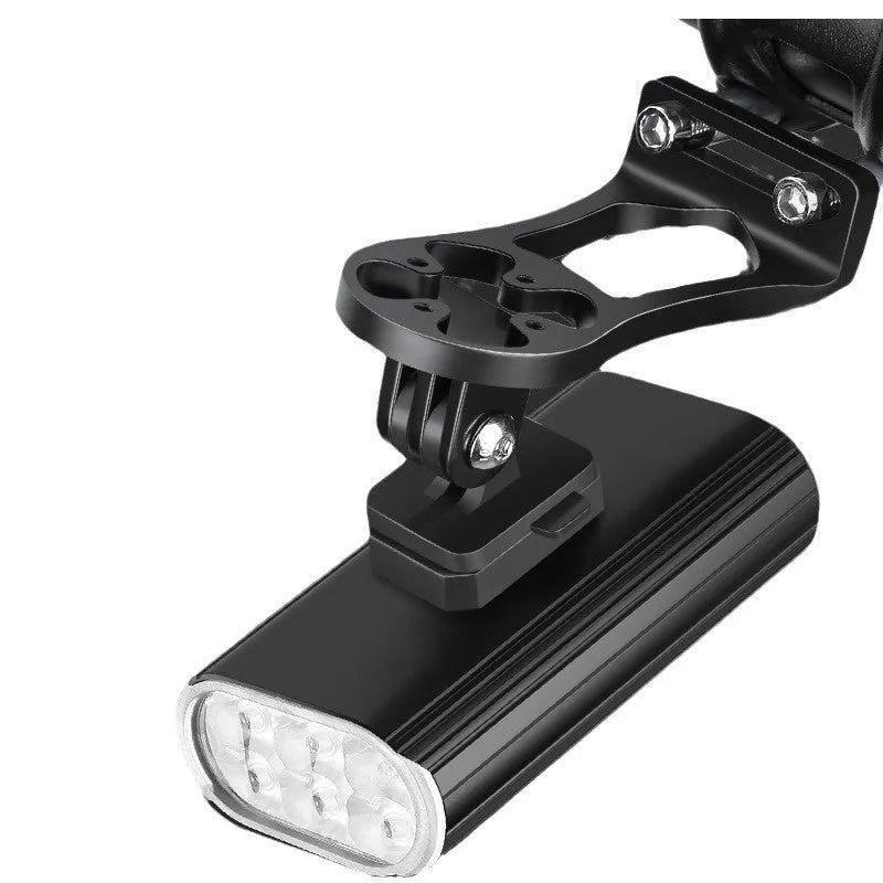 Silver aluminium bicycle headlight showing six XPT lamp beads with USB-C port and quick release mounting brackets