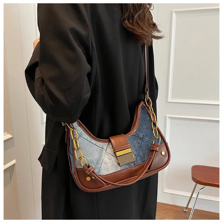 Brown soft denim women's bucket shoulder bag with diamond mesh and chain strap.