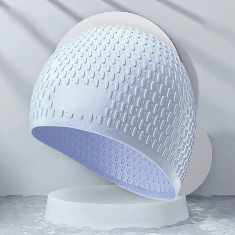 Adult solid colour silicone swimming cap with water drop design shown in multiple colour options.