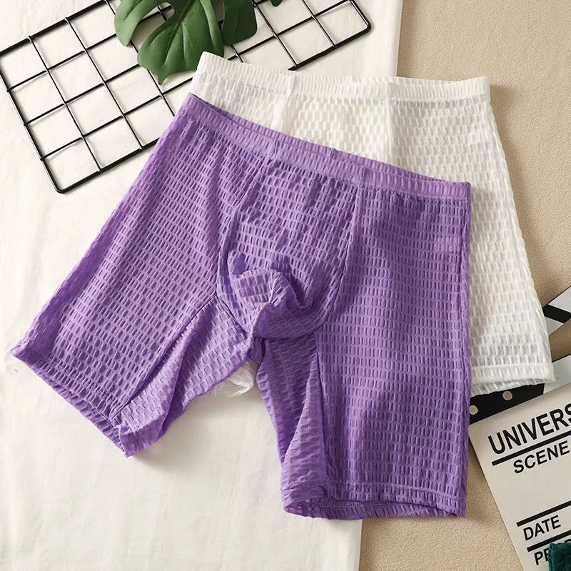 Men's solid colour lace boxer shorts in a hip-lifting, lengthened shaping style on a white background.