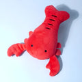 Red lobster squeaky dog toy measuring 12.5 cm for small and medium breeds