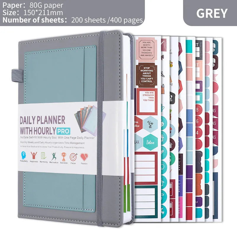 Undated A5 notebook with strap in purple PU cover, showing thread binding and closed with strap