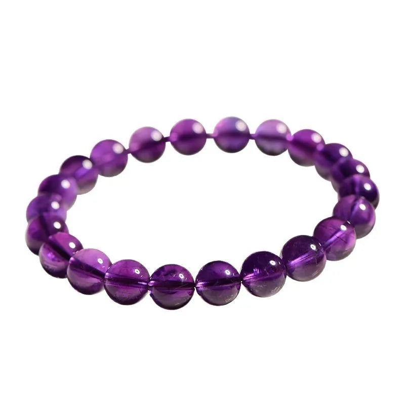 Natural amethyst Uruguay bracelet with scattered polished crystal beads on wrist