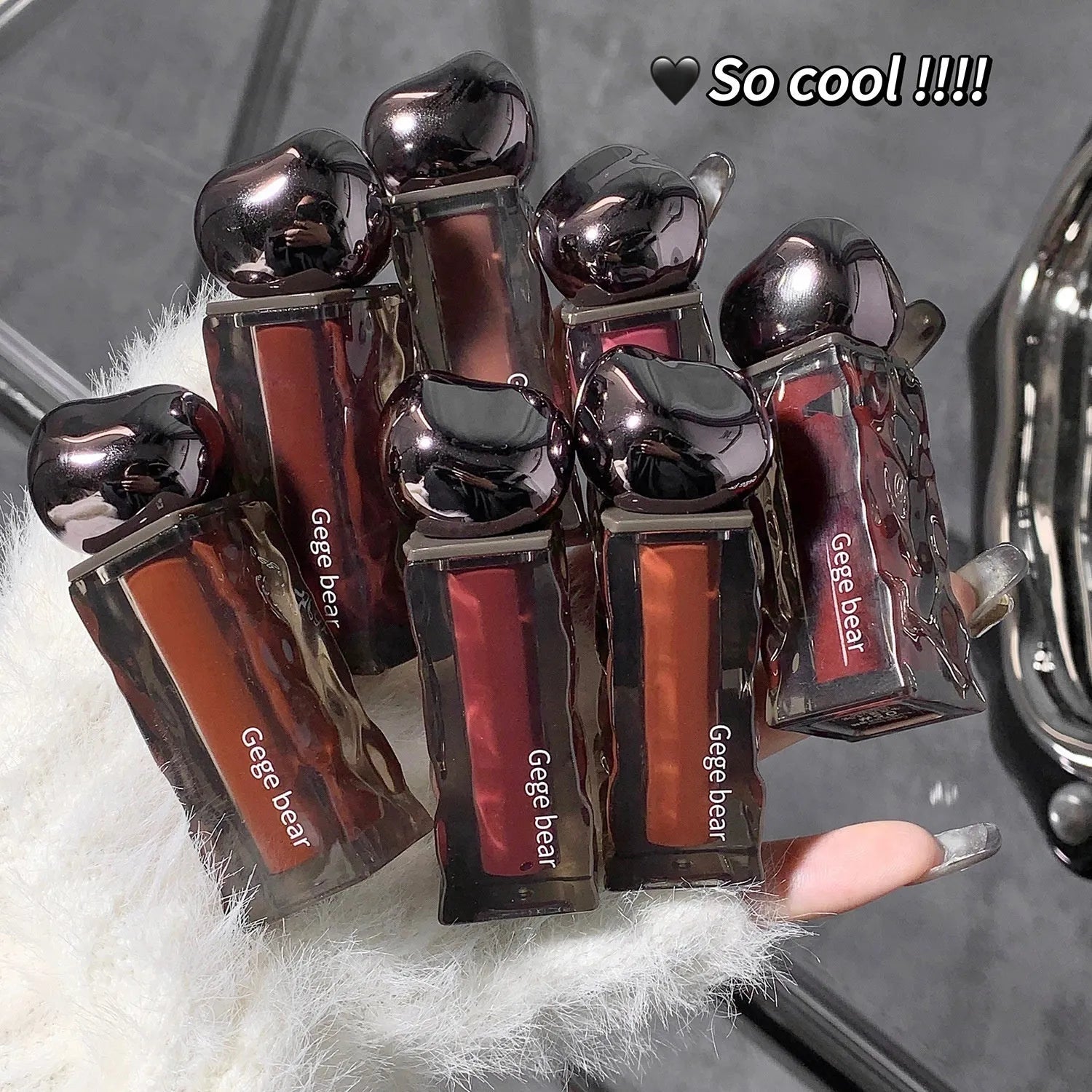 Glacier Lava Lip Lacquer tube showing water light mirror finish in one of seven available shades