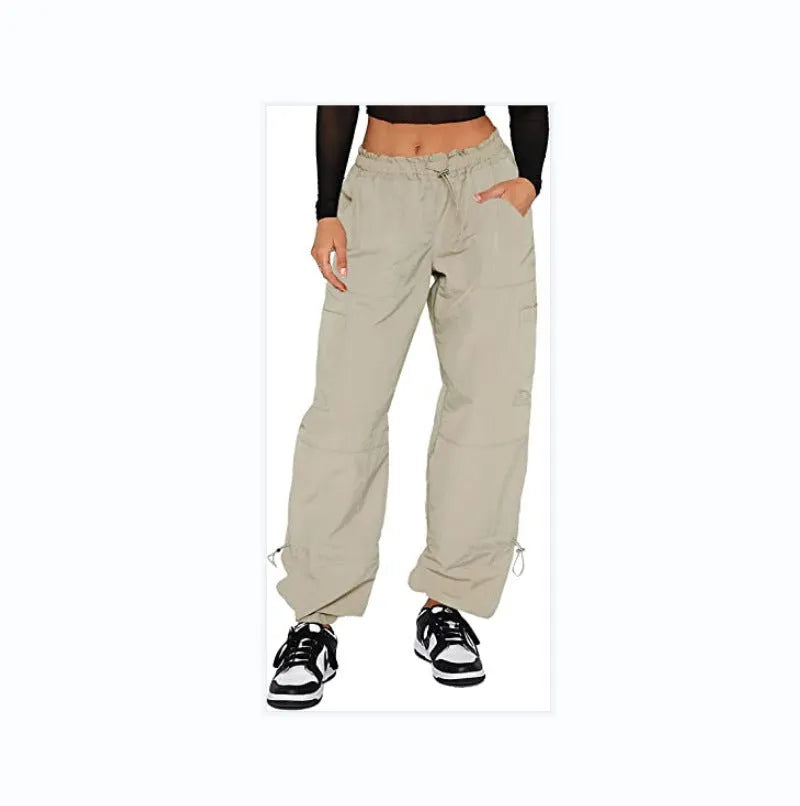 Straight leg multi-pocket cargo casual pants in polyester, shown in a neutral colour with a loose fit.