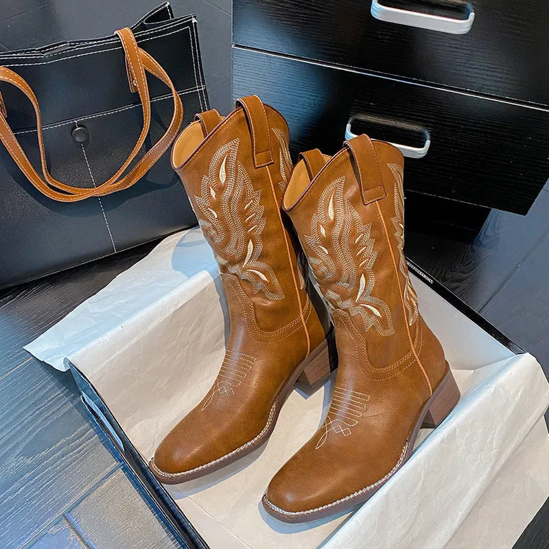 Brown women's mid-calf embroidered Martin boots with a round toe and low square heel