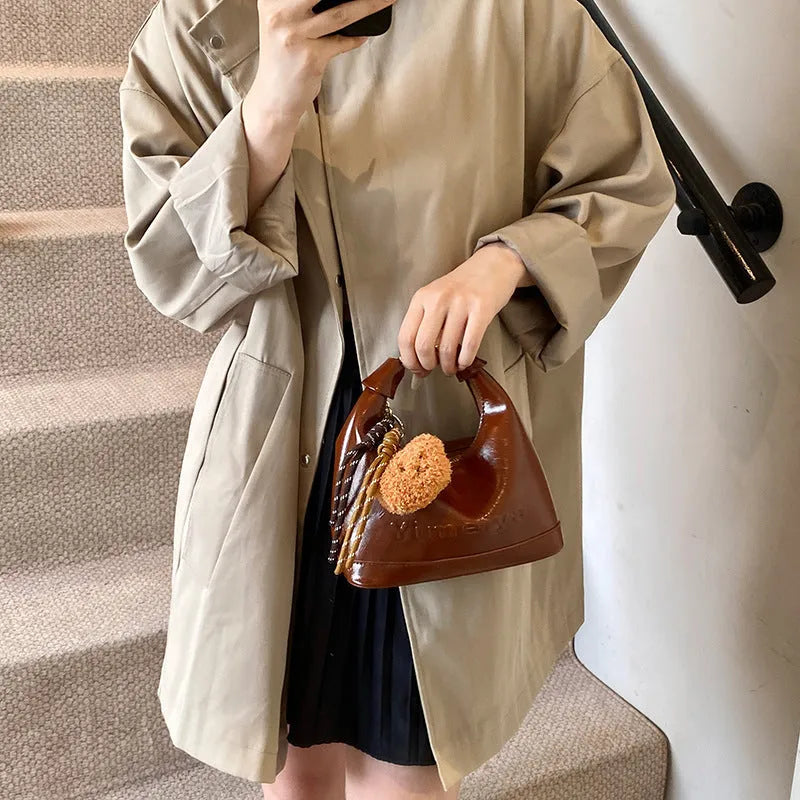 PU dumpling bag 20x9.5x20cm with sandwich pocket, available in black, brown, coffee, and red