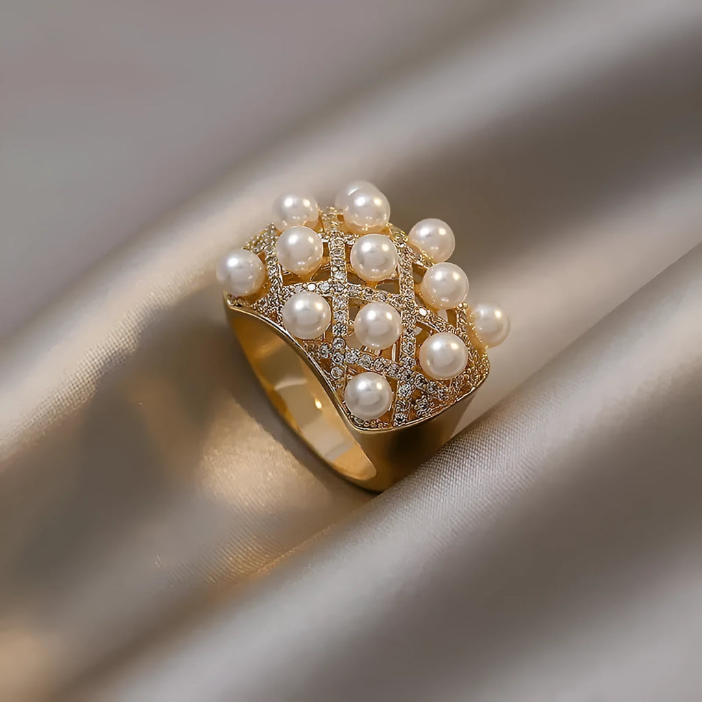 Copper zircon pearl geometric ring with 14K gold electroplated finish and adjustable opening for women.