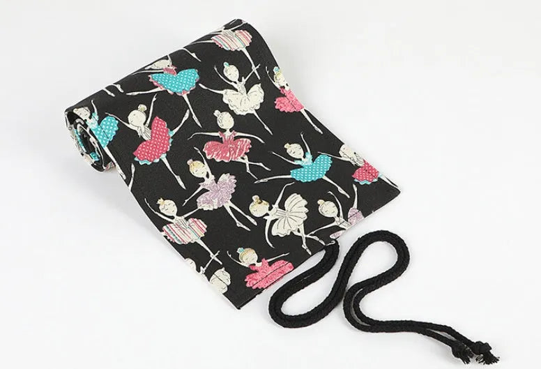 Square canvas rolling pencil case with ballet girl print design showing multiple pencil capacity options