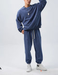 Men's polar fleece winter sports suit with crew neck coat and matching padded trousers in multiple colour options