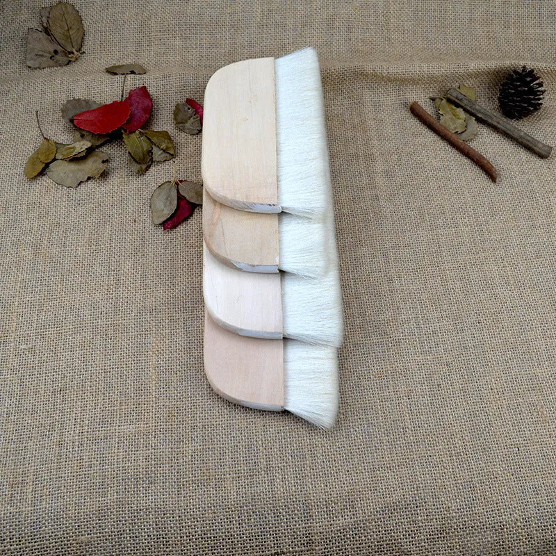 Wool art mounting brush in four different sizes for paste application and board shading