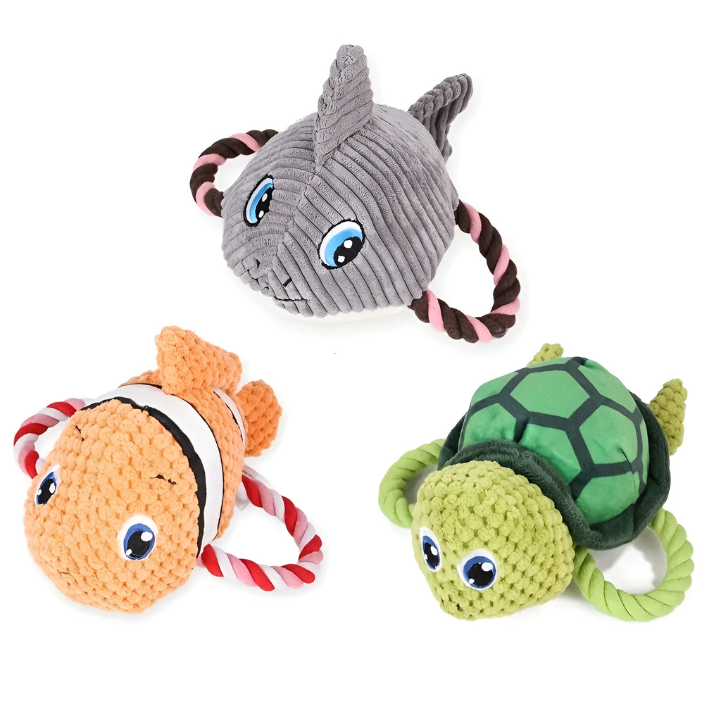 Turtle-shaped dog chewing toy with knotted fabric texture in orange colour