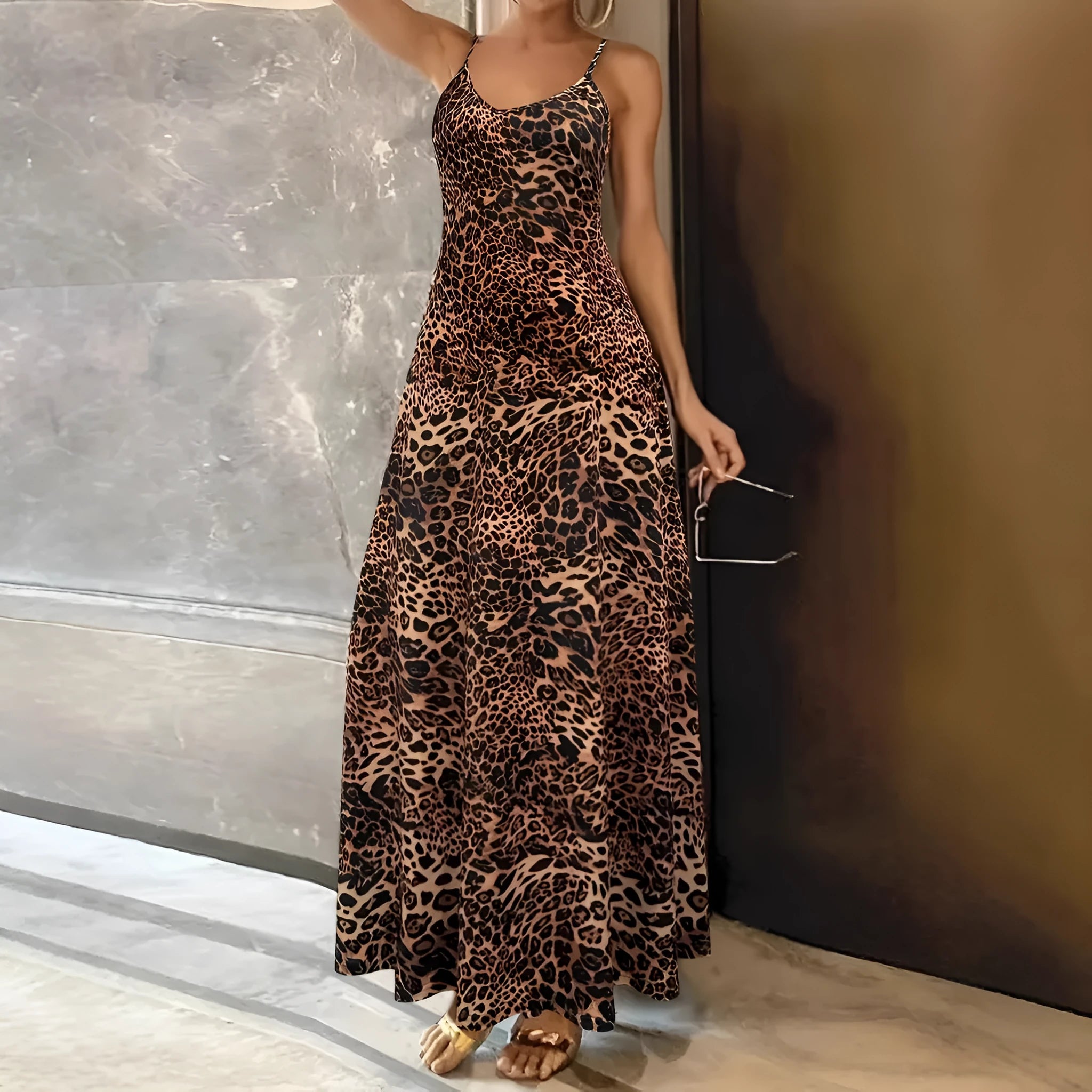 Dark brown leopard print casual sleeveless dress with long skirt and sling straps.