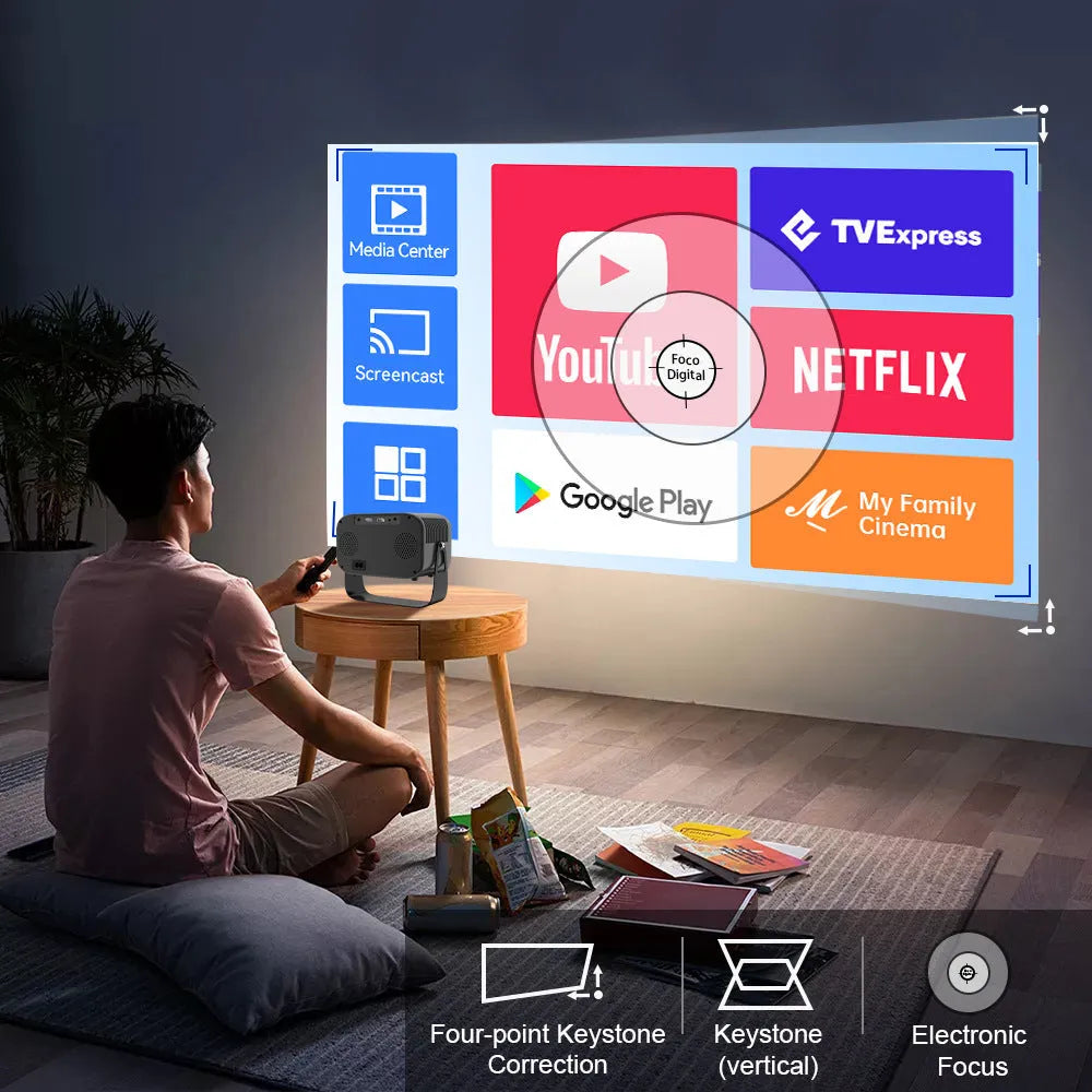 Black portable smart projector with Android system, remote control, and power cables