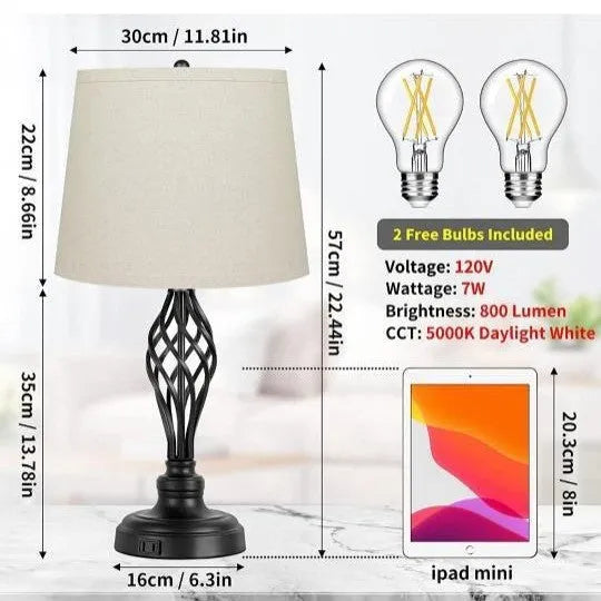 Modern alloy metal touch control bedside table lamp with USB port on a wooden surface.