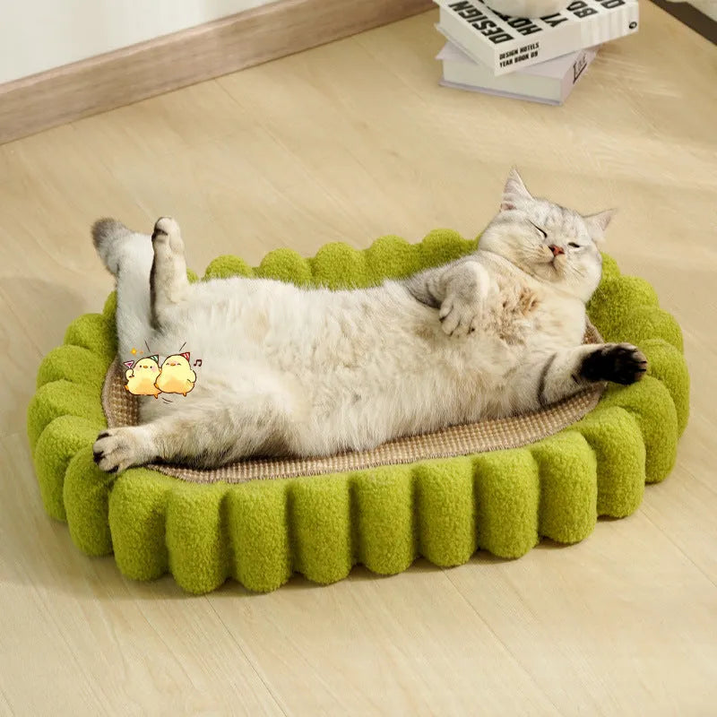 Green oval sisal cat scratcher pad bed measuring 650mm by 420mm