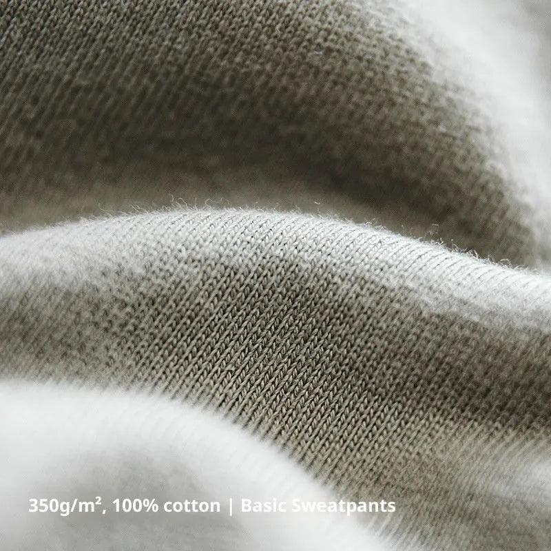 Marden Tooling retro tapered cotton sweatpants in olive green, straight leg with 3D cutting hemming