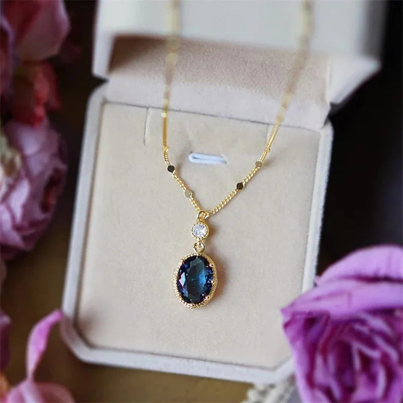 Gold geometric pendant necklace on chain with French retro design