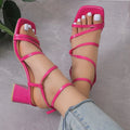 Beige plus size open toe slippers with a square toe and ankle buckle on a rubber sole.