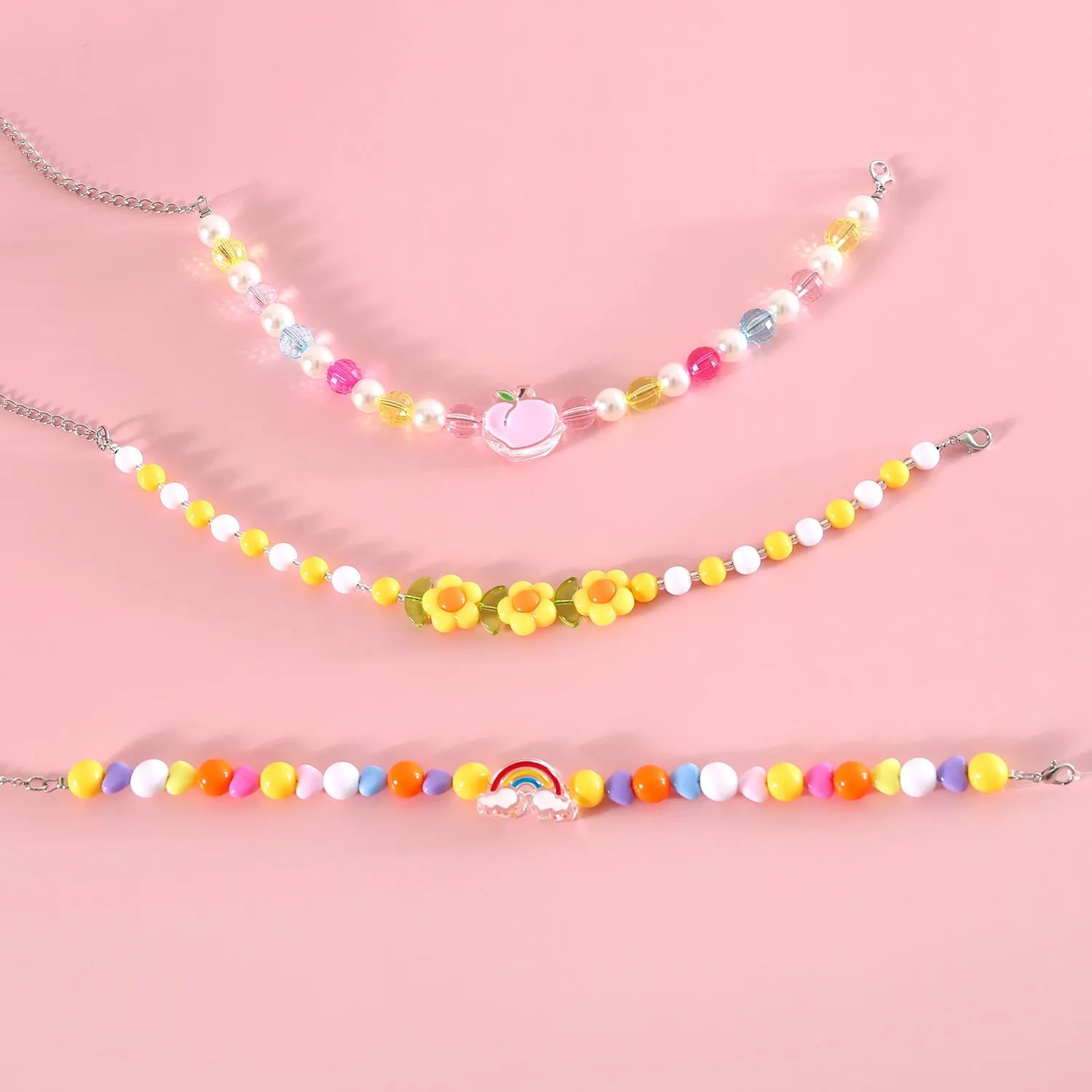 Adjustable colourful beads plastic cat necklace in peach, rainbow and small flower designs