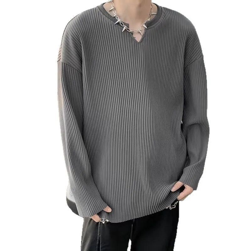 Plus size women's loose grey striped texture long sleeve pullover top on a hanger.