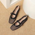 Women's beige mesh buckle sandals with a square toe and flat heel on a white background.