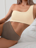 Women's one-shoulder one-piece swimsuit in solid colour polyester fabric